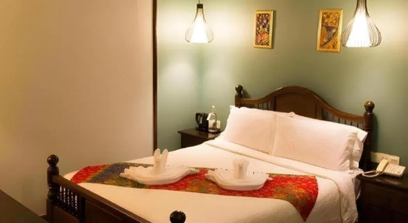 Bed in Anggun Boutique Hotel