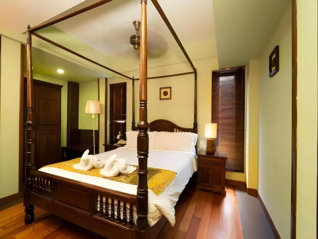 Bed in Anggun Boutique Hotel
