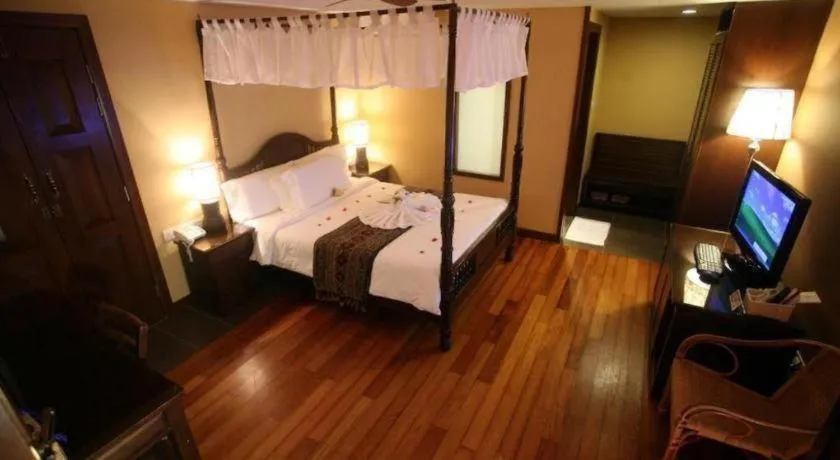 Bed in Anggun Boutique Hotel