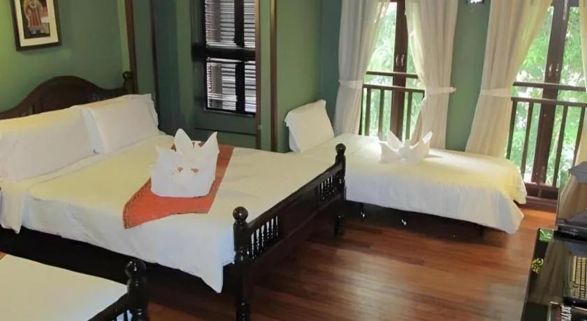 Bed in Anggun Boutique Hotel