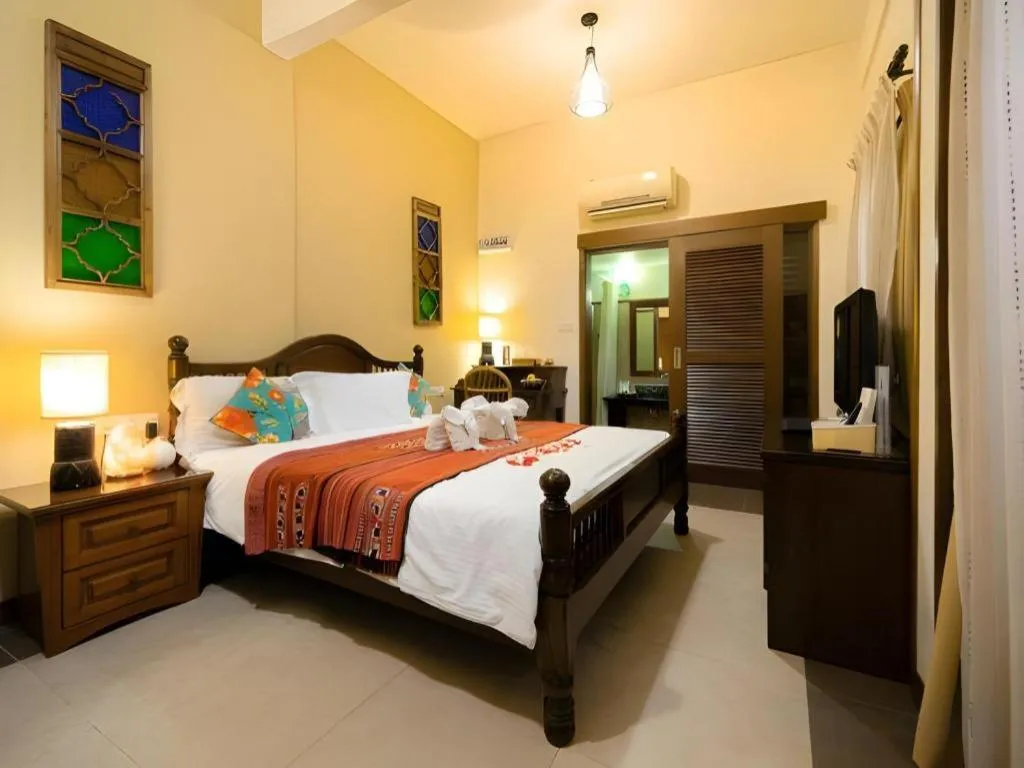 Bed in Anggun Boutique Hotel