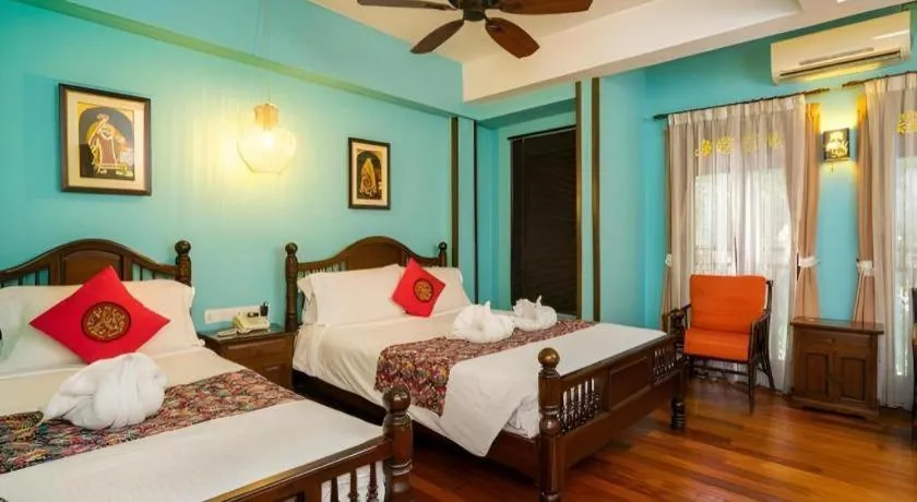 Bed in Anggun Boutique Hotel