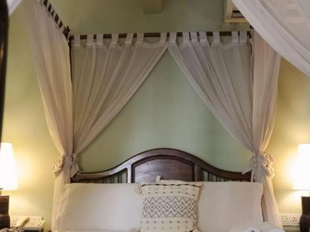 Bed in Anggun Boutique Hotel