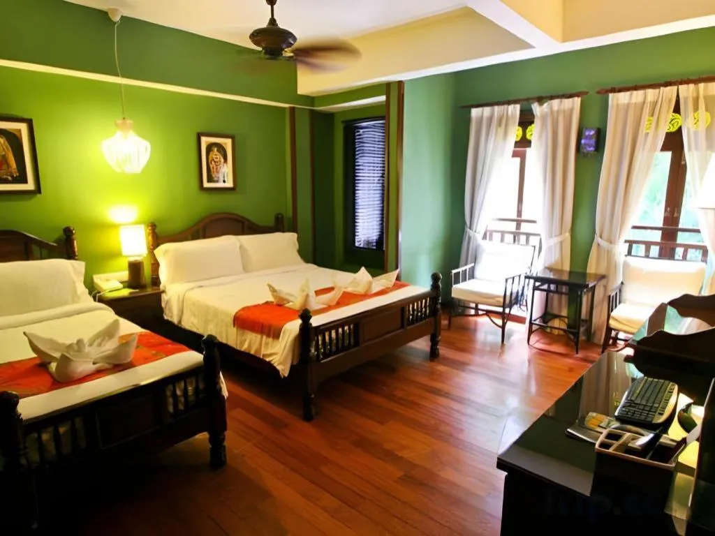 Bed in Anggun Boutique Hotel