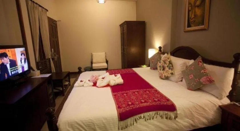 Bed in Anggun Boutique Hotel