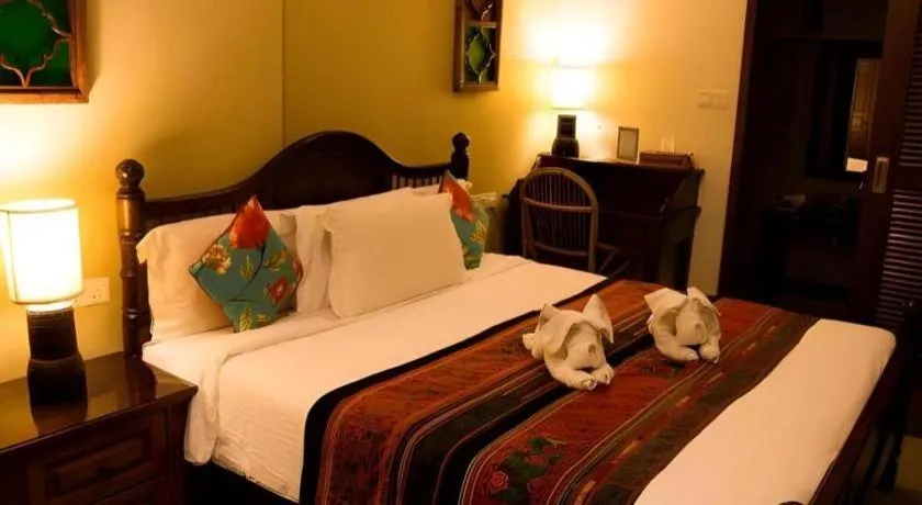 Bed in Anggun Boutique Hotel