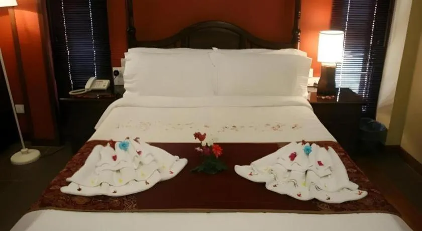 Bed in Anggun Boutique Hotel