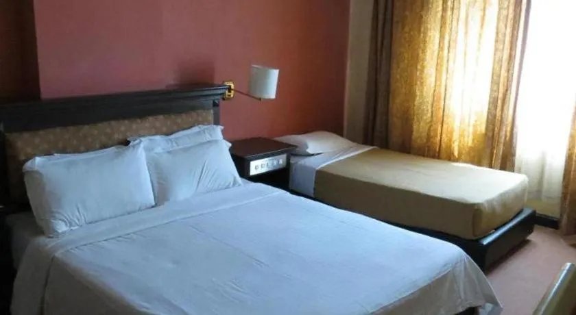 Bed in Kuala Lumpur International Hotel