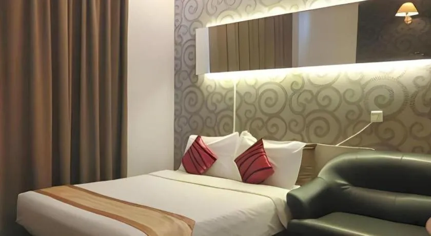 Bed in Paragon City Hotel