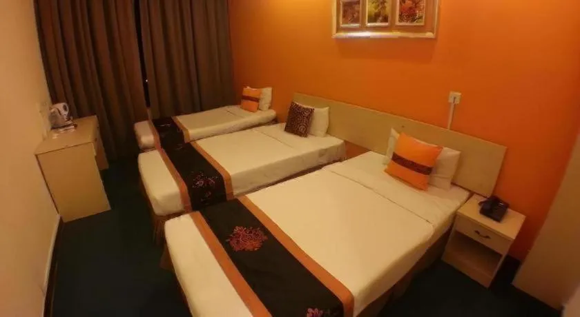 Bed in Paragon City Hotel