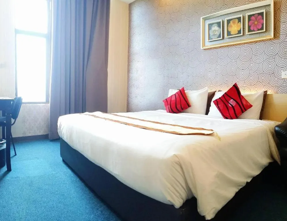 Bed in Paragon City Hotel