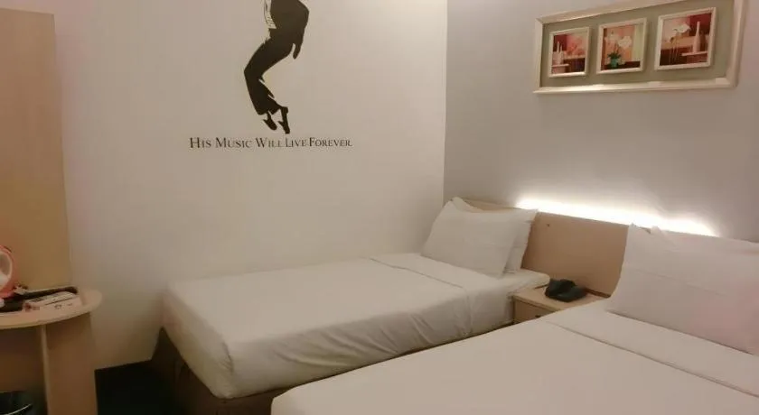 Bed in Paragon City Hotel