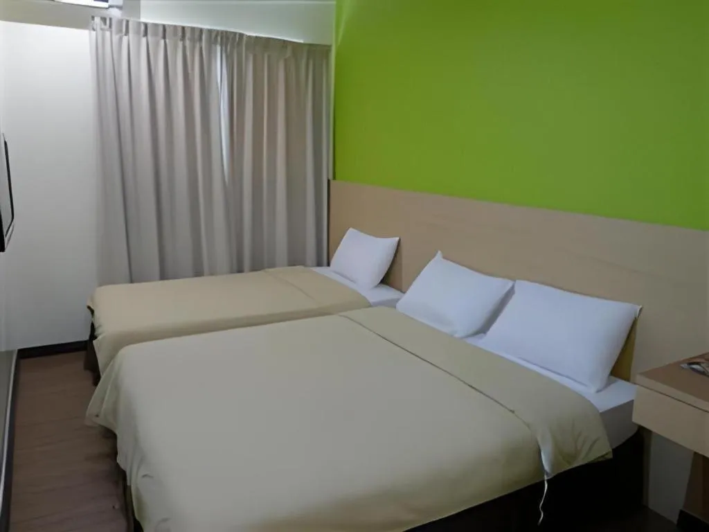 Bed in Maxim Hotel Kota Kinabalu