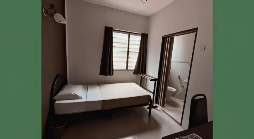 Bed in KRS Pines Hotel