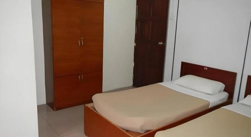 Bed in KRS Pines Hotel