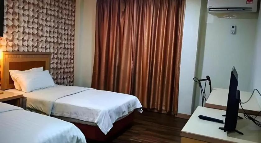 Bed in D'Borneo Hotel