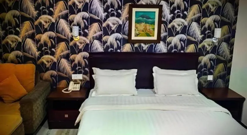 Bed in D'Borneo Hotel