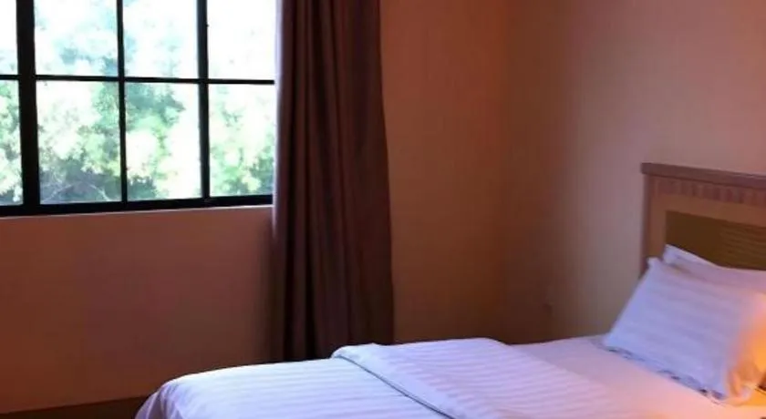 Bed in D'Borneo Hotel