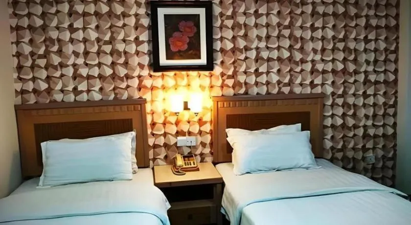 Bed in D'Borneo Hotel