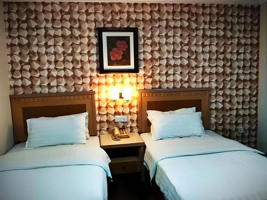 Bed in D'Borneo Hotel