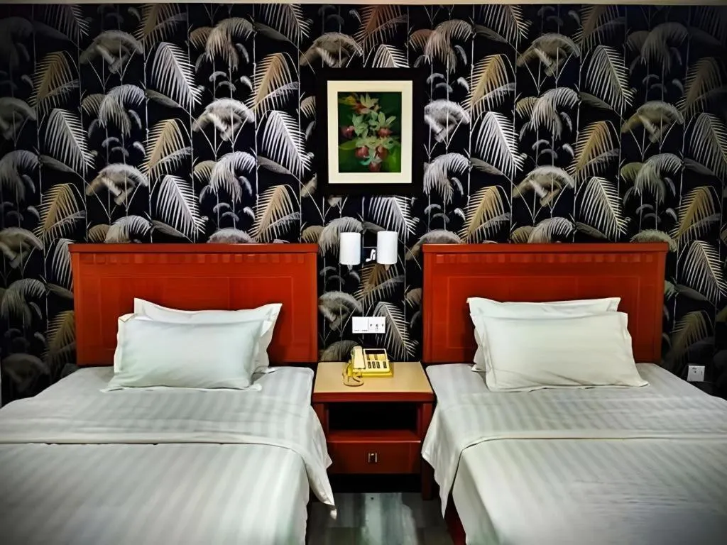 Bed in D'Borneo Hotel