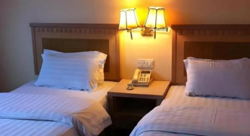 Bed in D'Borneo Hotel