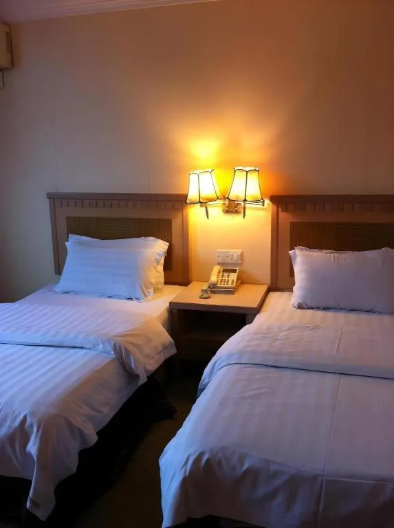 Bed in D'Borneo Hotel