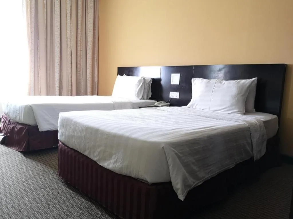 Bed in Perkasa Hotel Keningau