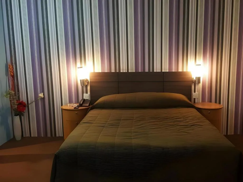 Bed in Klang Histana Hotel