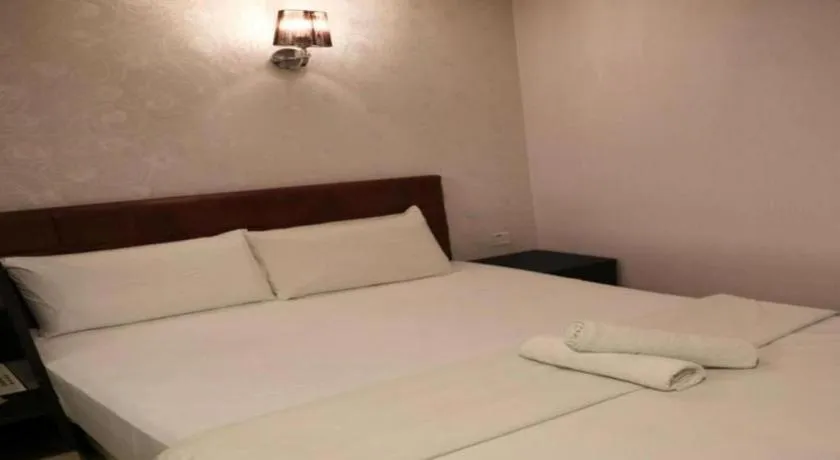 Bed in Hotel O D Nice Inn Hotel