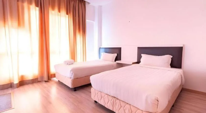 Bed in Hotel Zamburger Plaza Mahkota