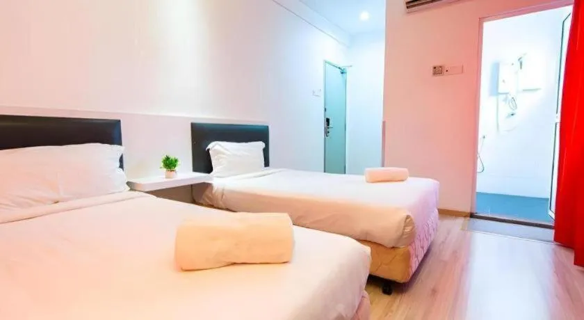 Bed in Hotel Zamburger Plaza Mahkota