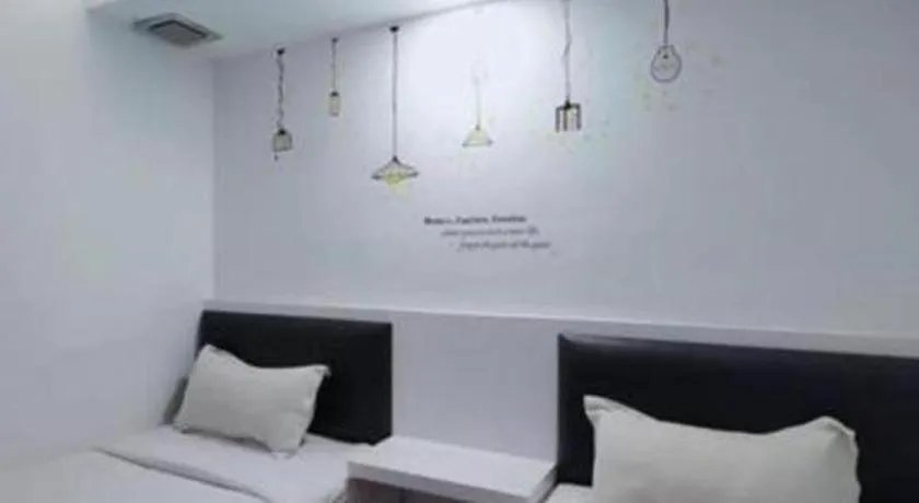 Bed in Hotel Zamburger Plaza Mahkota