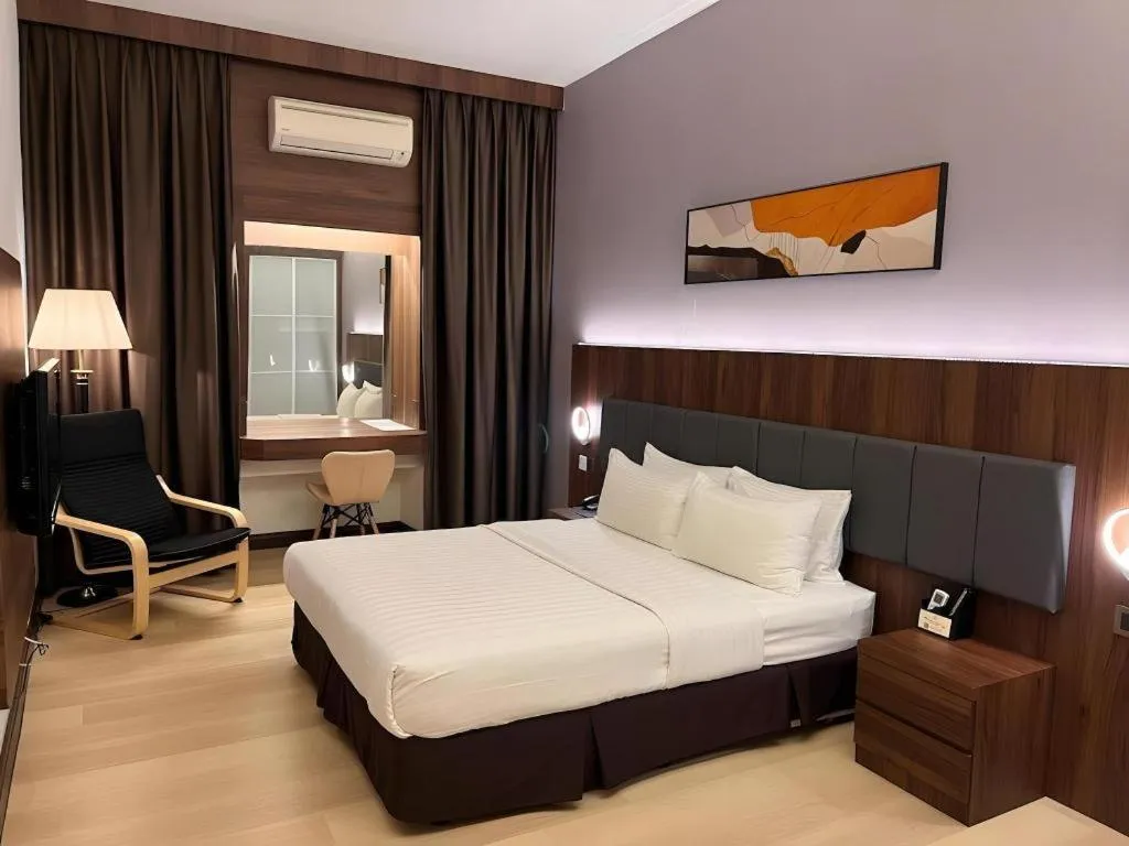 Bed in The Landmark Hotel