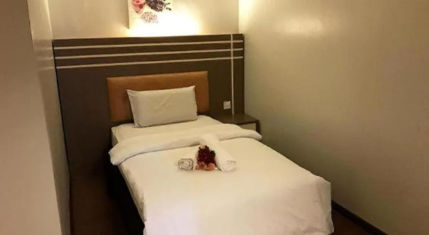 Bed in The Landmark Hotel