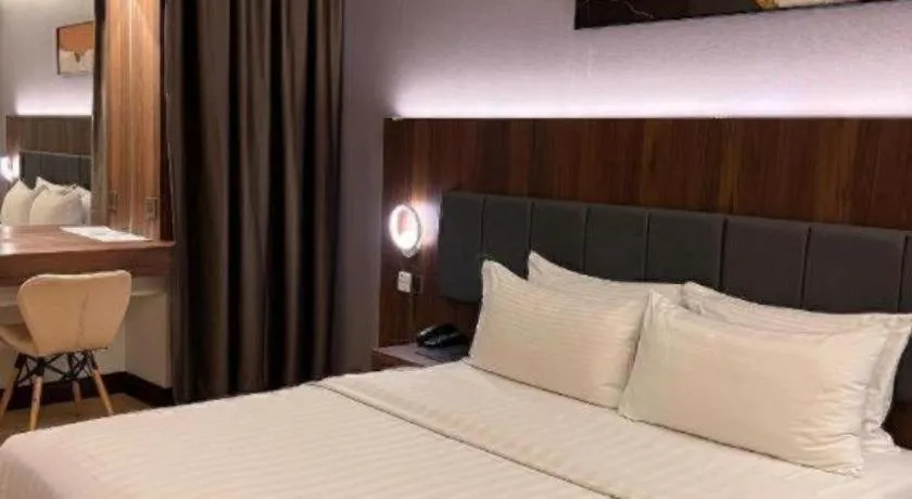 Bed in The Landmark Hotel