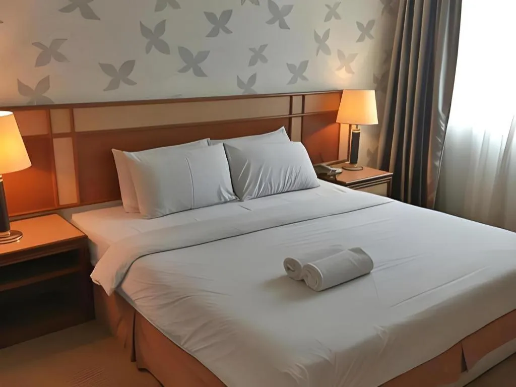 Bed in Pelican Hotel