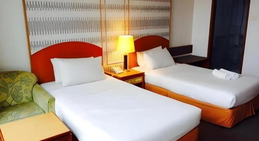 Bed in Pelican Hotel