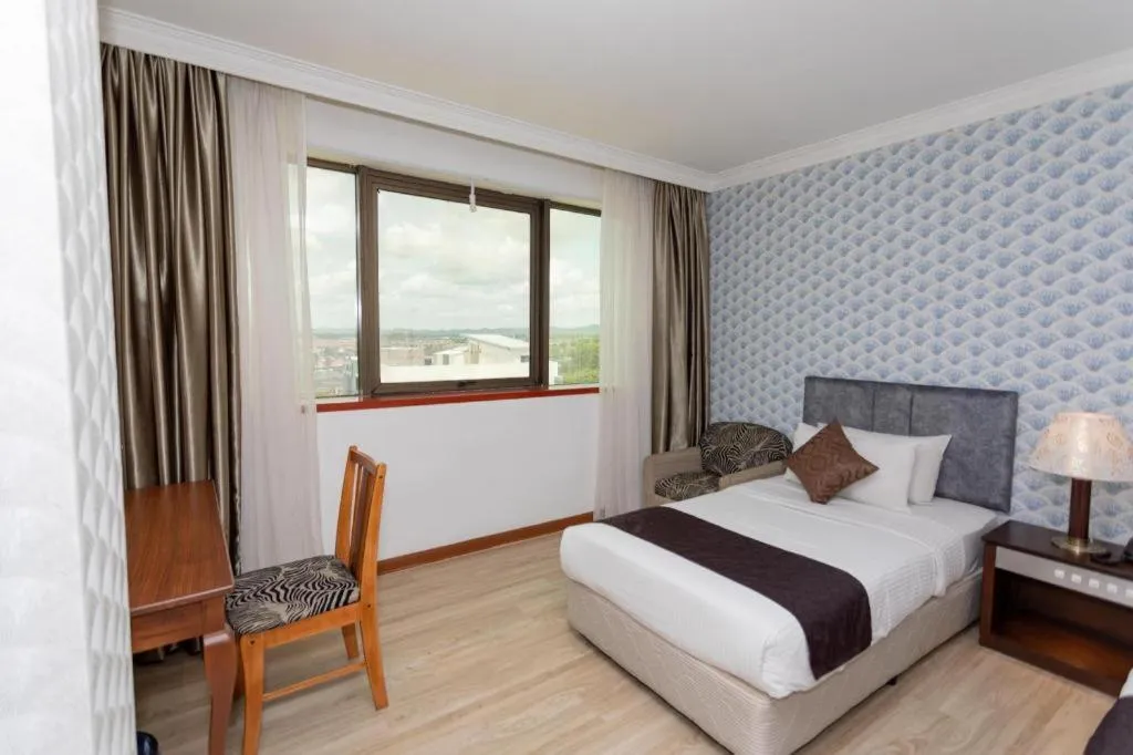 Bed in Pelican Hotel