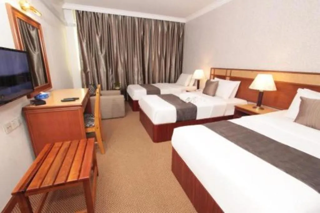 Bed in Pelican Hotel