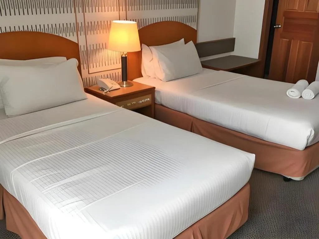 Bed in Pelican Hotel