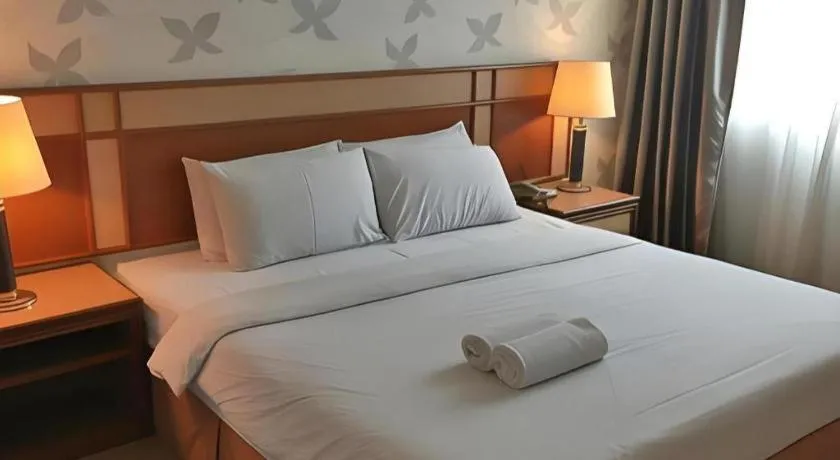 Bed in Pelican Hotel