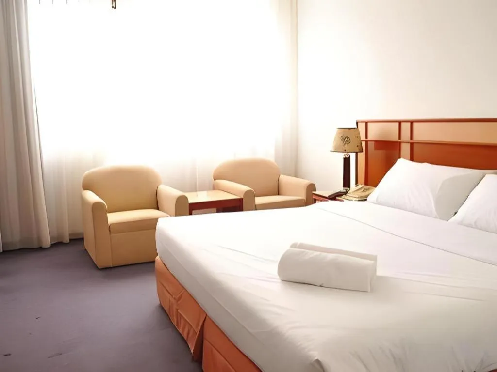 Bed in Pelican Hotel