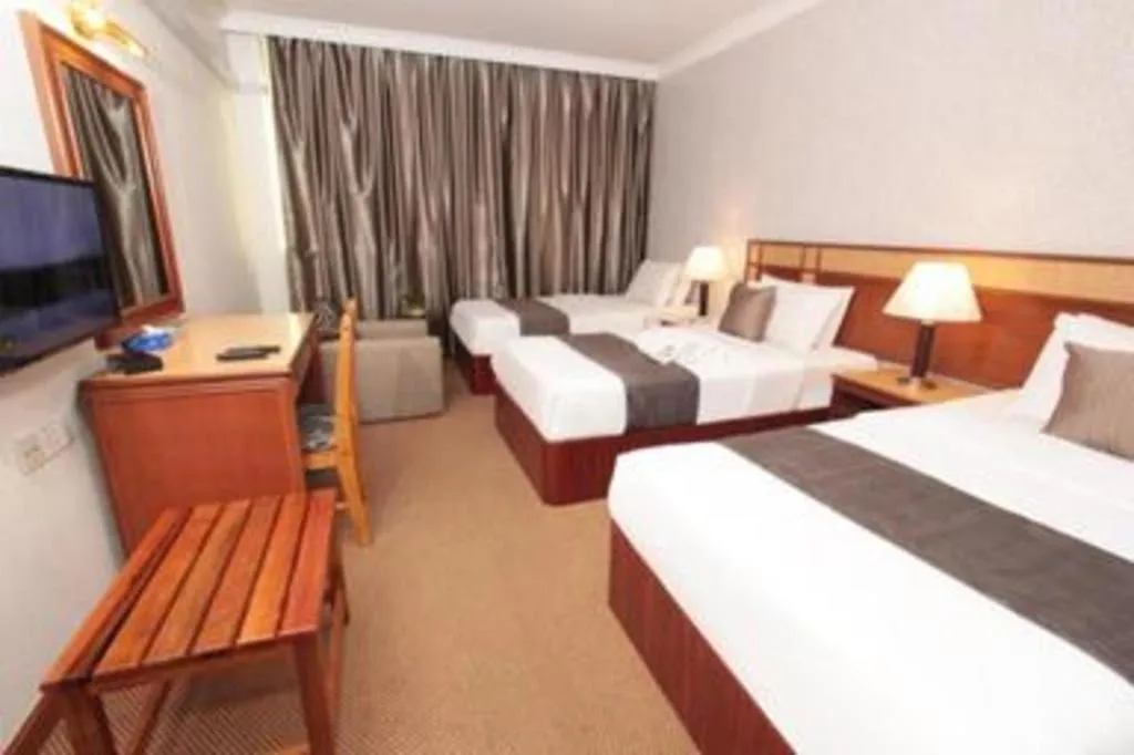 Bed in Pelican Hotel