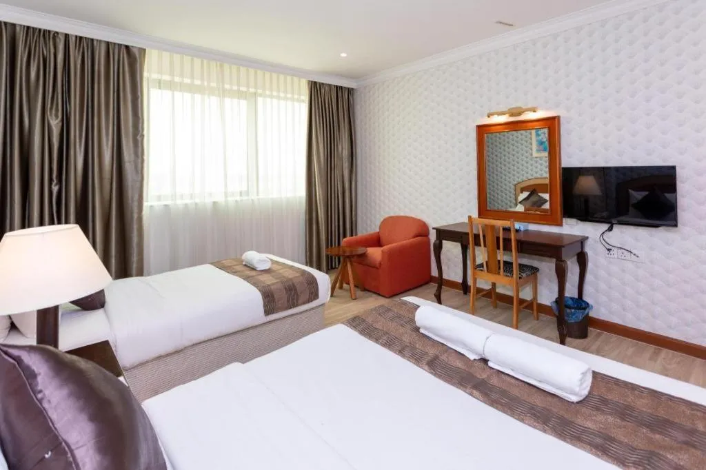 Bed in Pelican Hotel