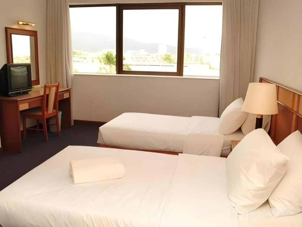 Bed in Pelican Hotel