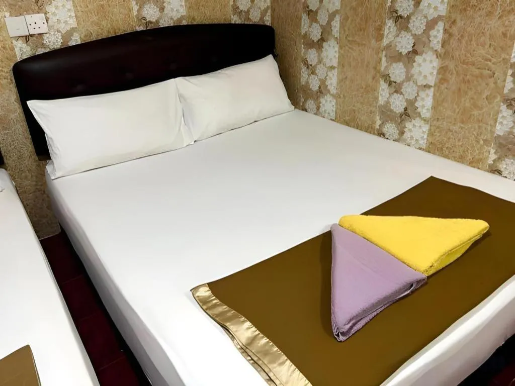 Bed in New Wave Hotel Melawati