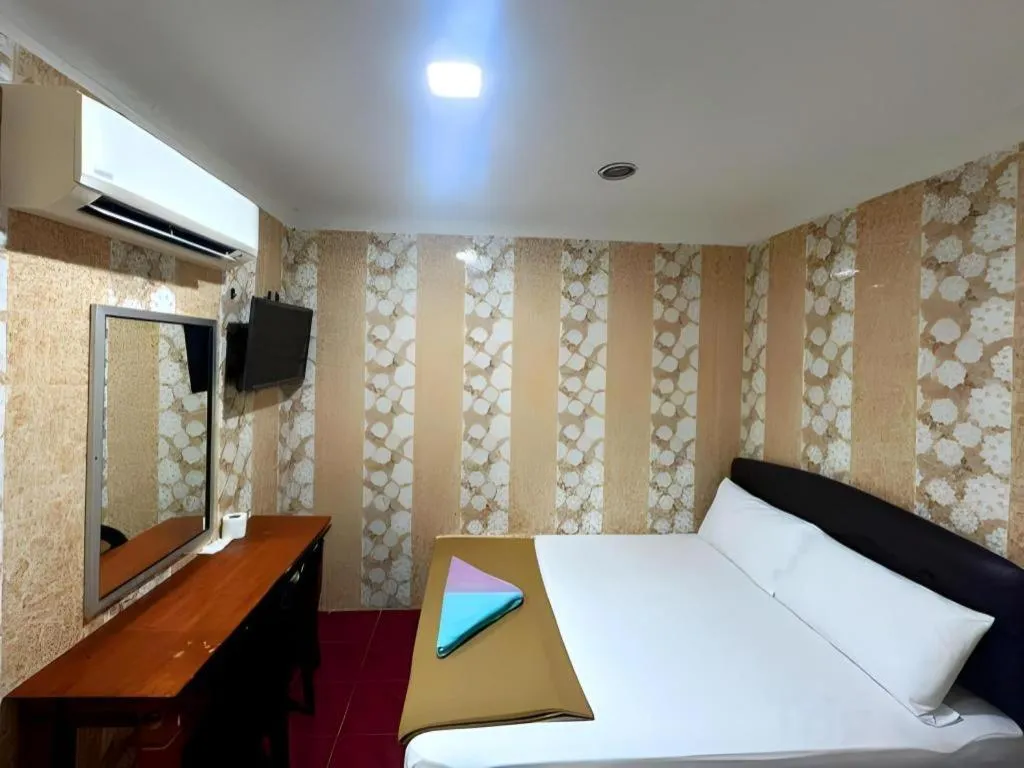 Bed in New Wave Hotel Melawati