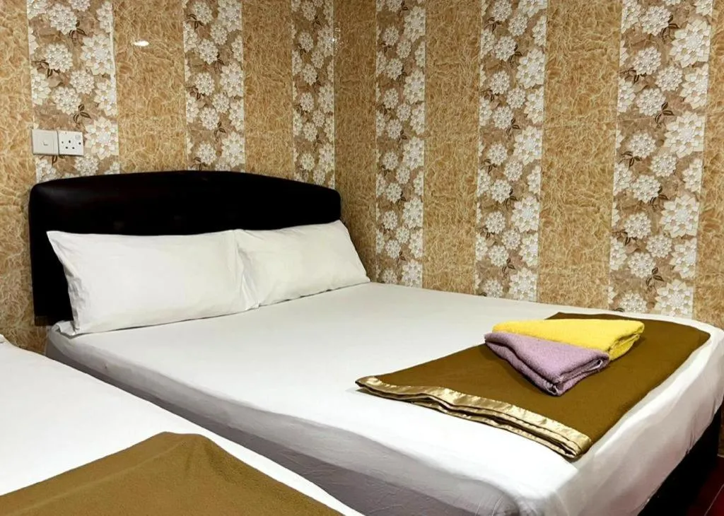 Bed in New Wave Hotel Melawati