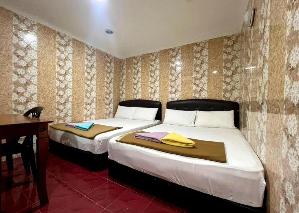 Bed in New Wave Hotel Melawati